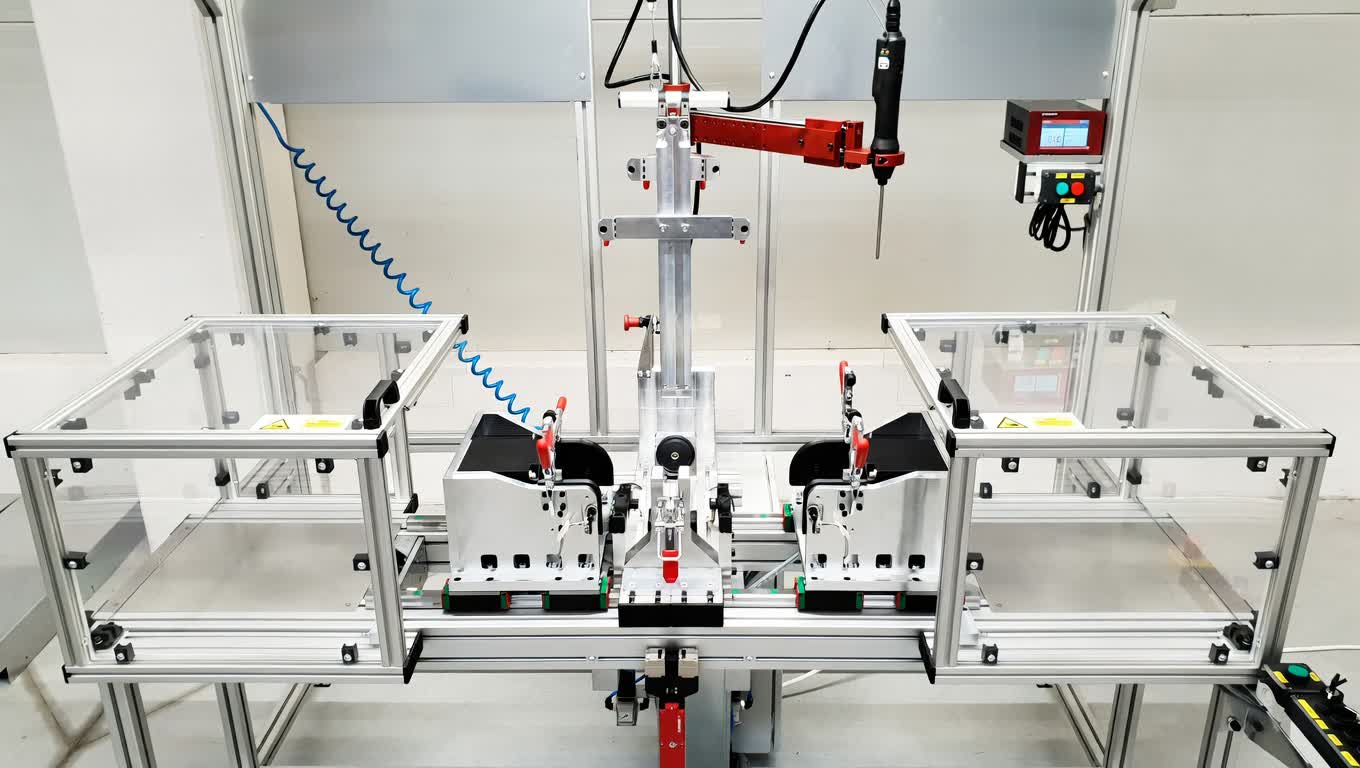 3D CAD design of automated assembling station with robotic arm placement