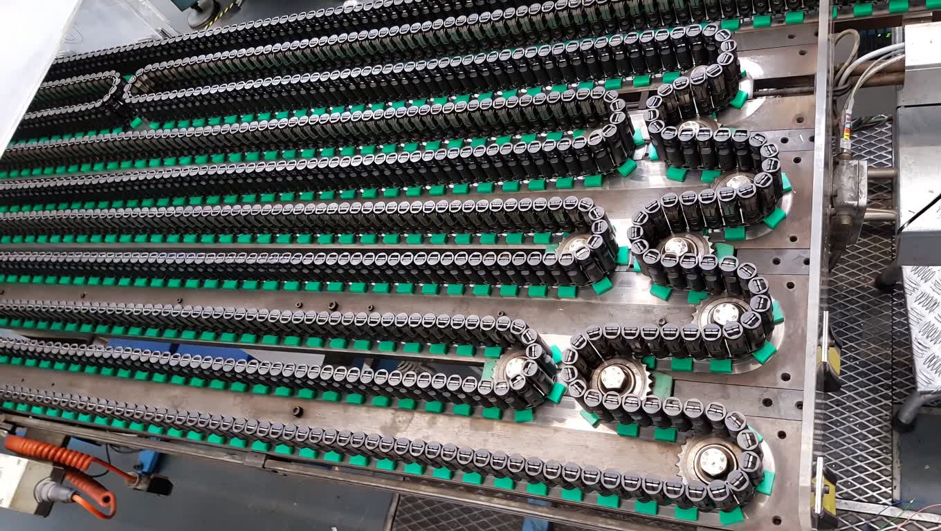Chain carrier system enhanced with improved tensioning and wear-resistant components