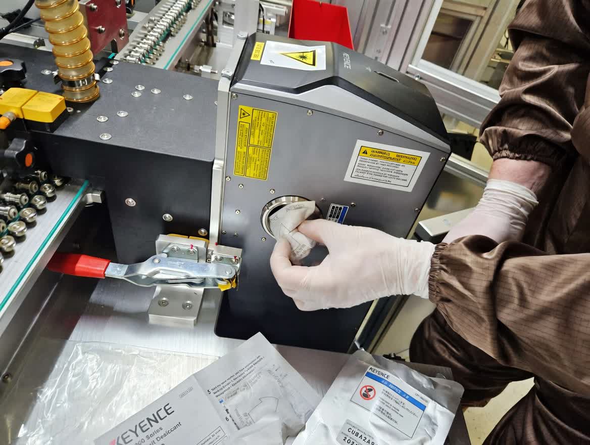 Laser head preventive maintenance including optics cleaning and focus adjustment