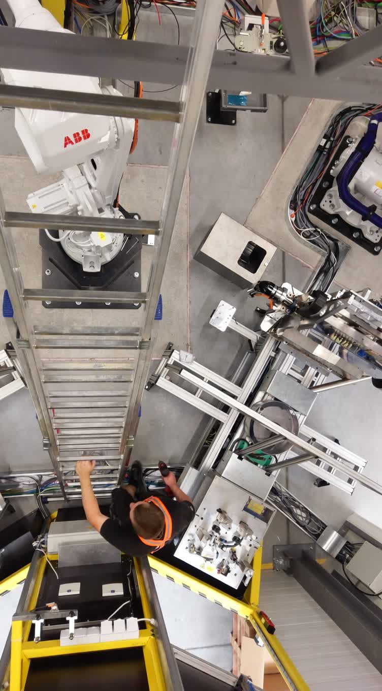 Welding cell implementation at customer site with safety enclosure assembly