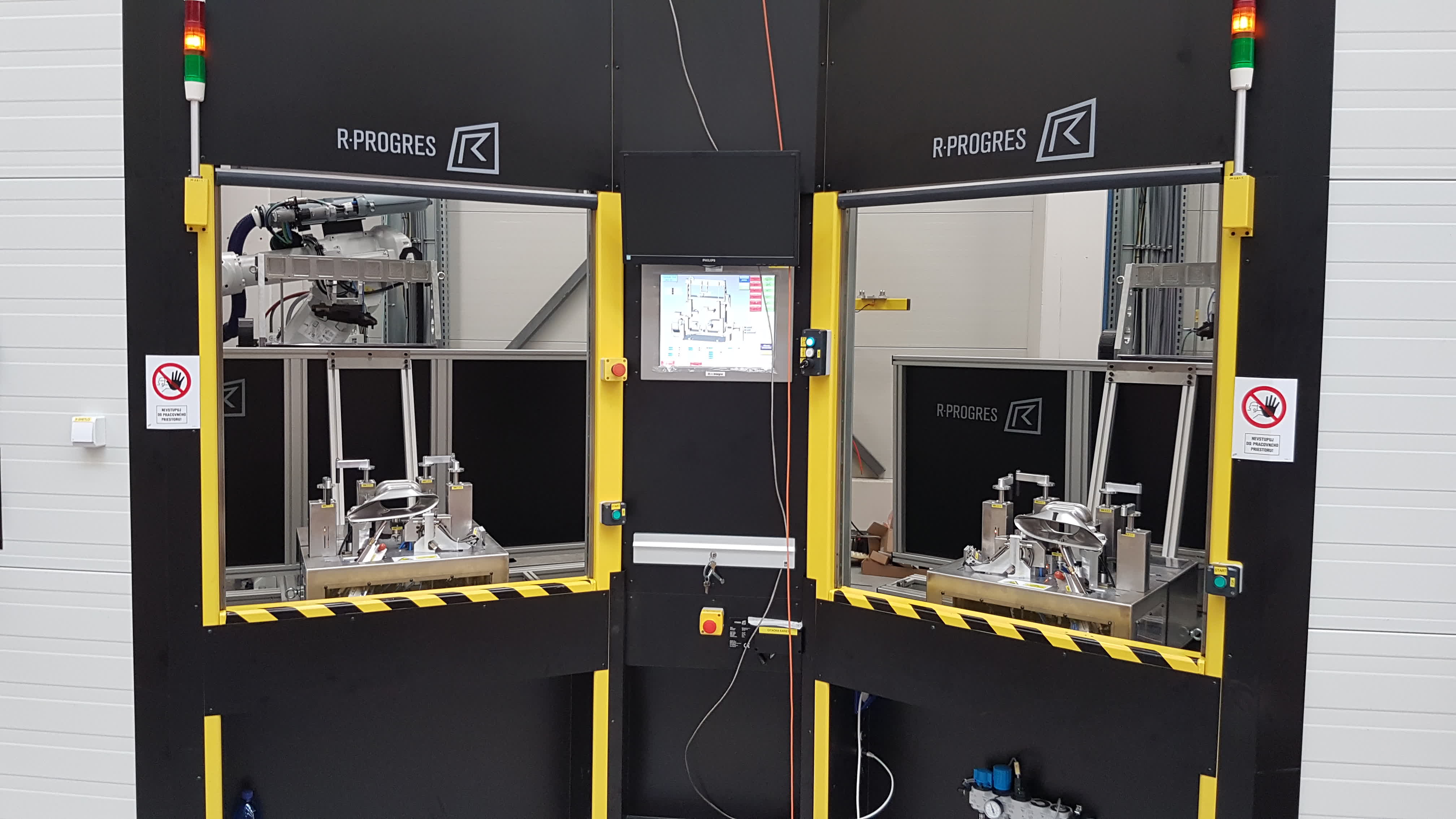 Four-robot welding cell for stainless steel exhaust components using laser, arc, and spot welding with dual rotary positioners 3
